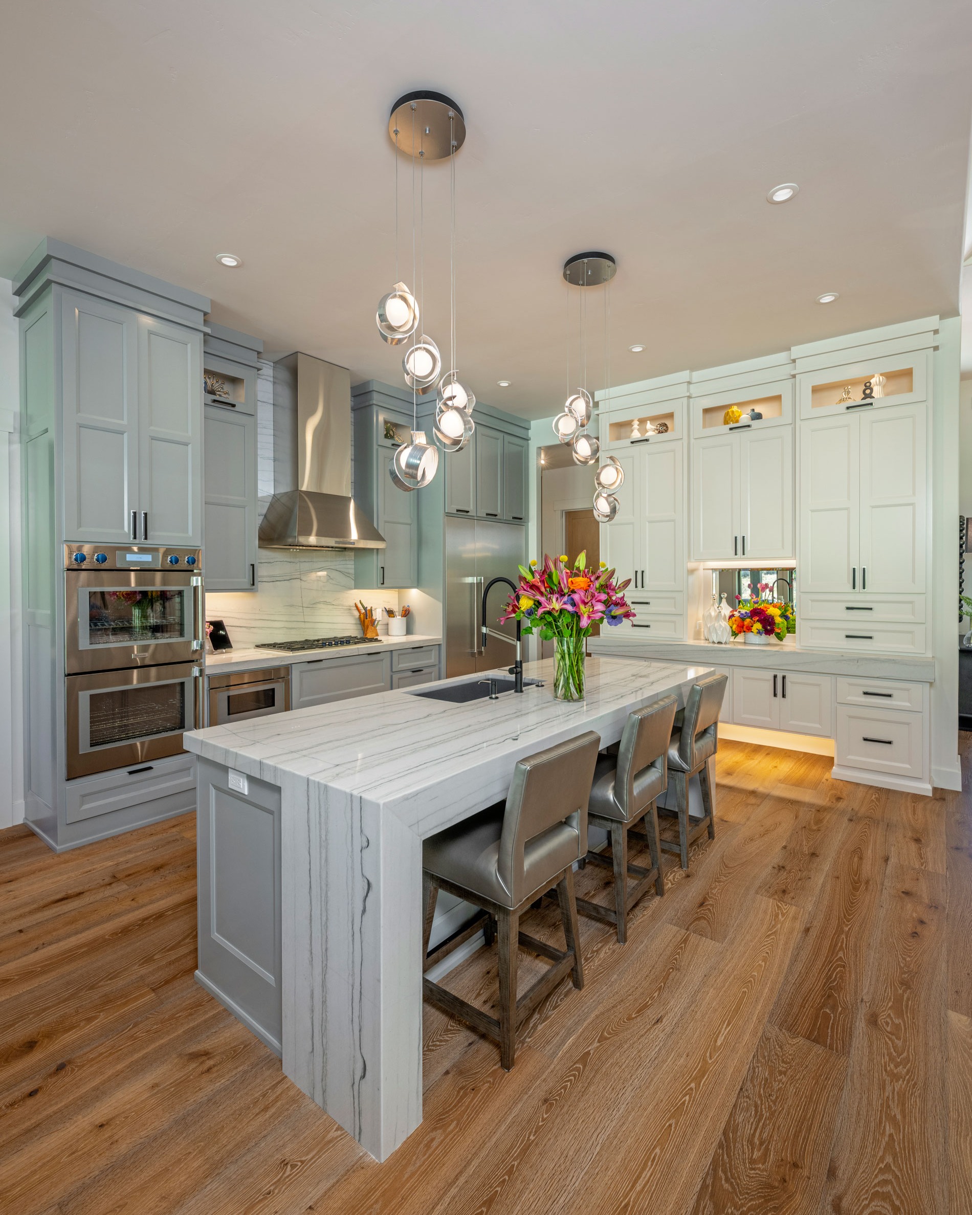 Special Touches for 'Forever Home'
.
"Because the homeowners love to cook, they requested a spacious kitchen. It features light-colored cabinets with granite countertops plus toe-kick lighting. It is also easy to access the butler’s pantry that includes darker, ebony-toned cabinets as well as an illuminated storage area to show off an impressive liquor and stemware collection."
.
Builder: @rosenbergerconstruction 
.
By: Joe Butler
.
Photography by: @joelrinerphotography